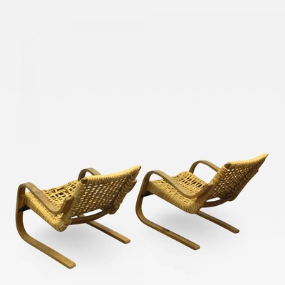 Alvar Alto for Artclair pair of curved wood rope lounge chairs