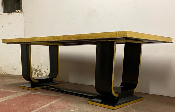 Art deco rarest long gold leaf and black lacquered dinning table