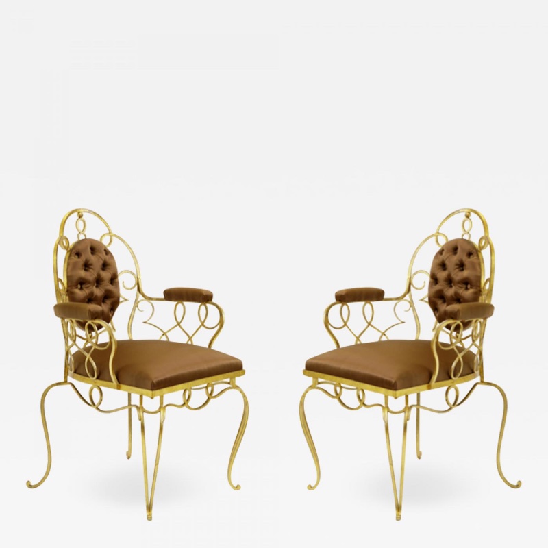 Attributed Rene Prou pair of gold leaf wrought iron arm chairs