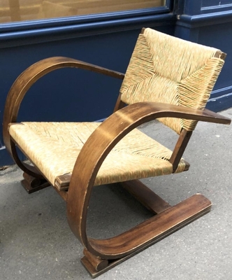 Audoux Minet pair of bent wood lounge chair with a rush cover