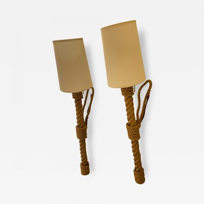 Audoux Minet spectacular pair of torch shaped sconces