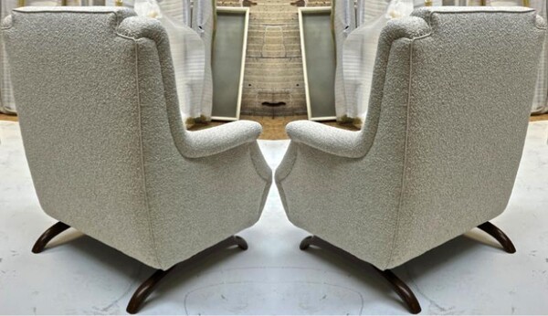 Awesome comfy pair of lounge chairs with horn shaped legs
