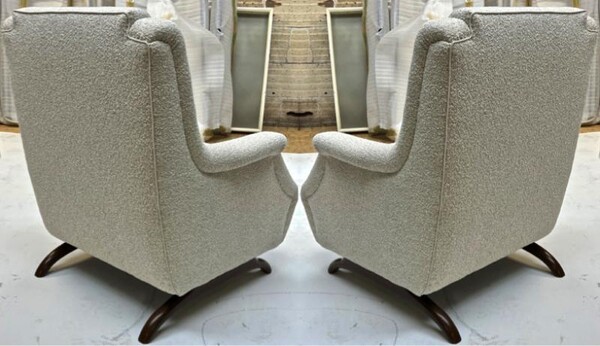 Awesome comfy pair of lounge chairs with horn shaped legs