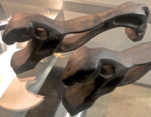 Awesome pair of cheetah shaped solid iron andirons