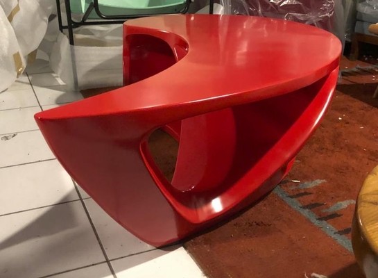 Boomerang shaped red abstract coffee table