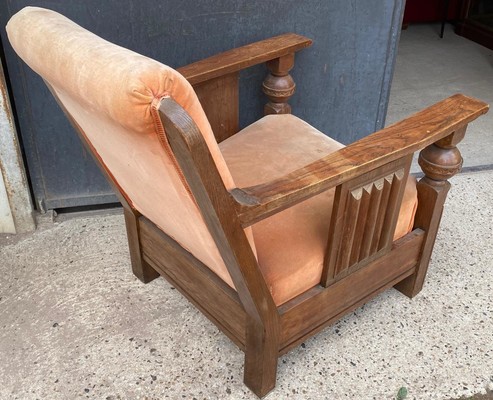 Charles Dudouyit documented pair of rare carved oak lounge chairs