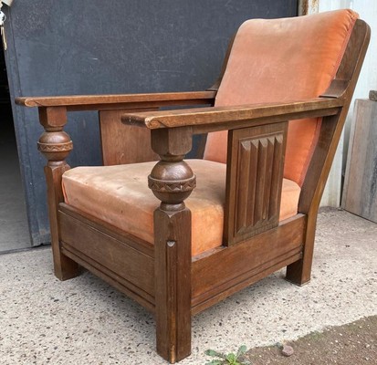 Charles Dudouyit documented pair of rare carved oak lounge chairs