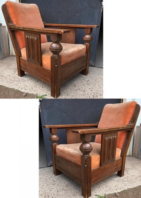 Charles Dudouyit documented pair of rare carved oak lounge chairs