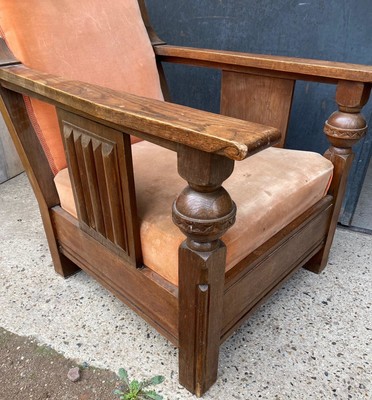 Charles Dudouyit documented pair of rare carved oak lounge chairs