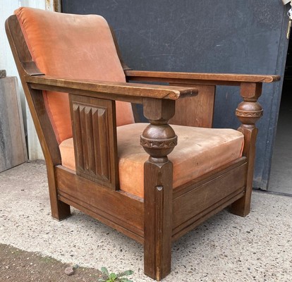 Charles Dudouyit documented pair of rare carved oak lounge chairs