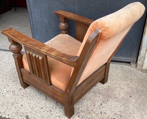 Charles Dudouyit documented pair of rare carved oak lounge chairs