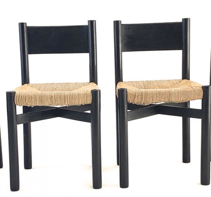 Charlotte Perriand exceptional set of 8 black meribel chairs