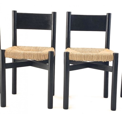 Charlotte Perriand exceptional set of 8 black meribel chairs