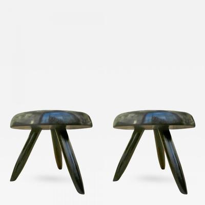 Charlotte Perriand pair black tripod stools.