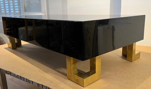 Guy Lefebre pure black lacquered coffee table with gold legs