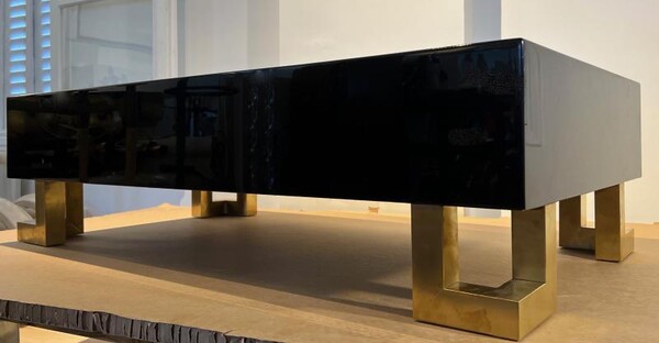 Guy Lefebre pure black lacquered coffee table with gold legs