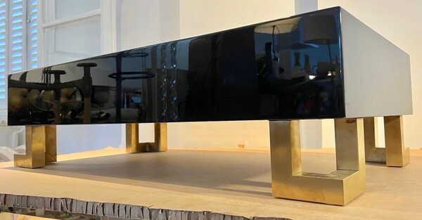 Guy Lefebre pure black lacquered coffee table with gold legs