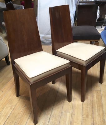 In the style of Jean Michel Frank pair of walnut chairs