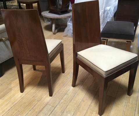 In the style of Jean Michel Frank pair of walnut chairs
