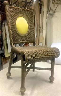 In the style of Jean Royere Set of Ten Rattan Dining Chairs