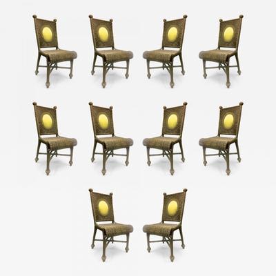 In the style of Jean Royere Set of Ten Rattan Dining Chairs