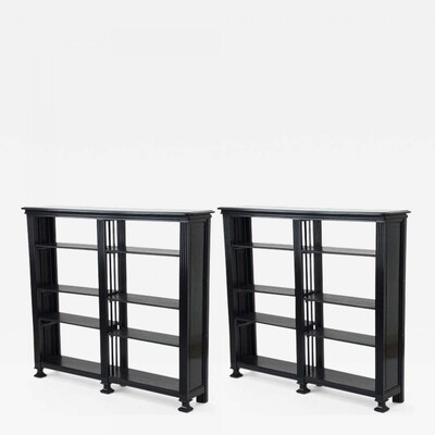 J.C Moreux pair of adjustable shelves black oak library