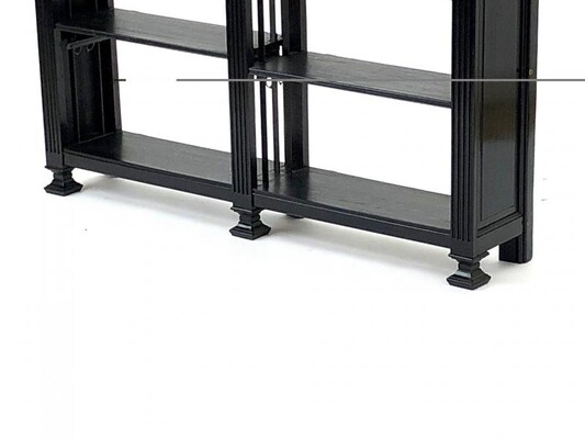 J.C Moreux pair of adjustable shelves black oak library