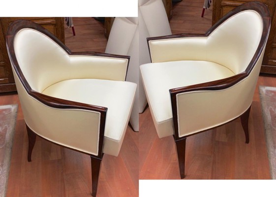J.E.Ruhlmann pair of refined solid Makassar arm chairs 