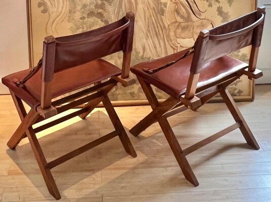 Jacques Adnet documented hand stitched leather pair of chairs