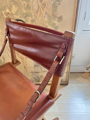 Jacques Adnet documented hand stitched leather pair of chairs