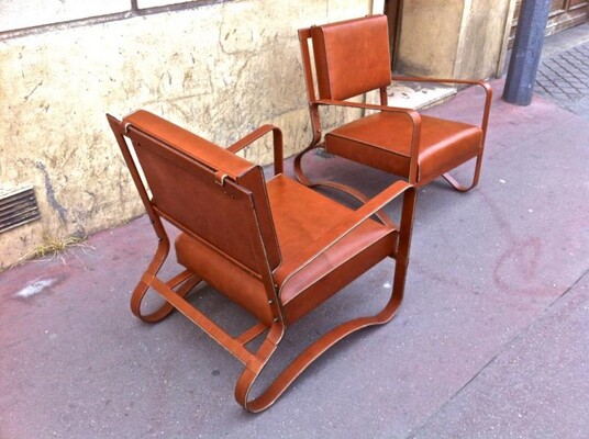 Jacques Adnet Pair Lounge Chairs in Hand-Stitched Leather
