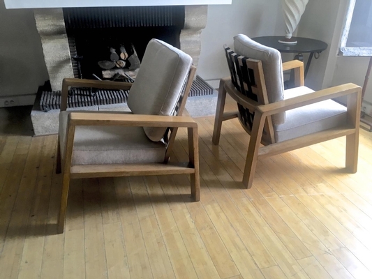 Jean Royere Documented Pair of Oak Lounge Chairs 