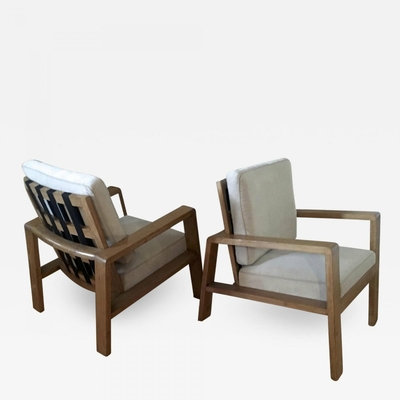 Jean Royere Documented Pair of Oak Lounge Chairs 