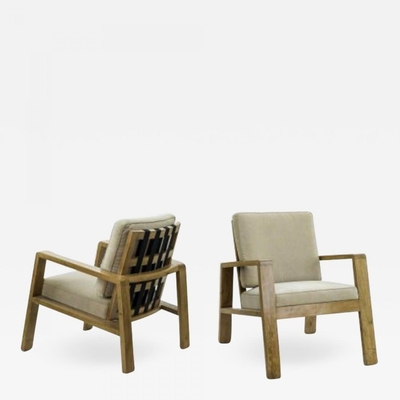Jean Royere Documented Pair of Oak Lounge Chairs 