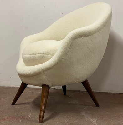 Jean Royere high oeuf chair newly covered in raw white wool