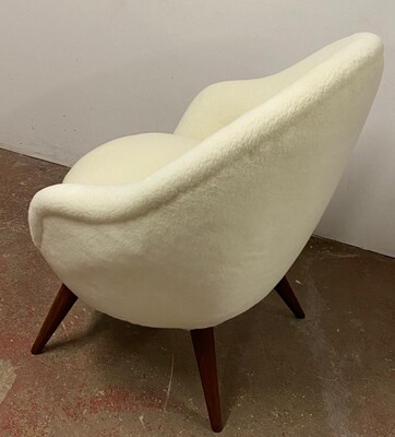 Jean Royere high oeuf chair newly covered in raw white wool
