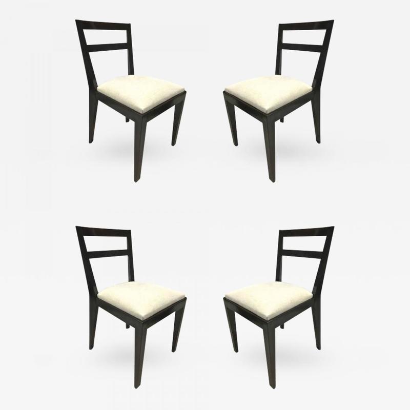 Jean Royère set of four black chairs