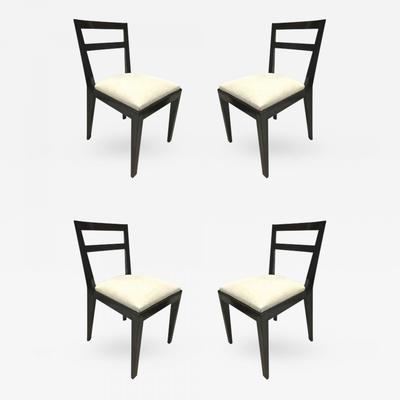 Jean Royère set of four black chairs