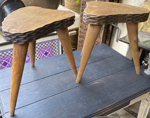 Jean Touret style pair of oak tripod stools carved 