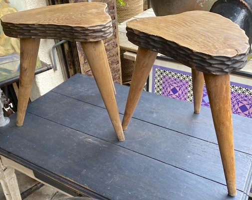 Jean Touret style pair of oak tripod stools carved 