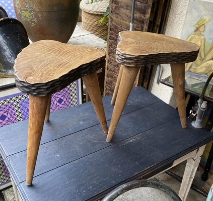 Jean Touret style pair of oak tripod stools carved 