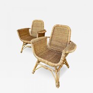 Louis Sognot refined pair of rattan arm chairs in good vintage