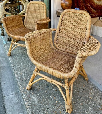 Louis Sognot refined pair of rattan arm chairs in good vintage