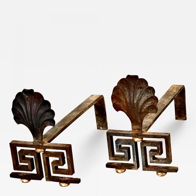 Maison Bagues leaf refined pair of scallop shaped andirons