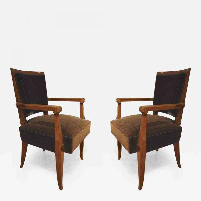 Maxime Old attributed pair refined solid walnut arm chairs