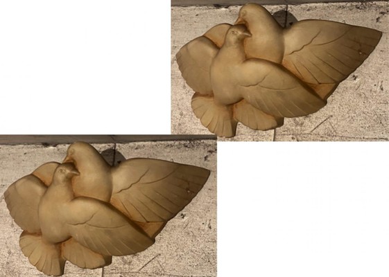 pair of patinated plaster turtle dove sconces