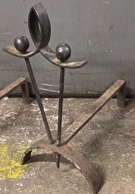 Pair of witty andirons in the style of Raymond Subes