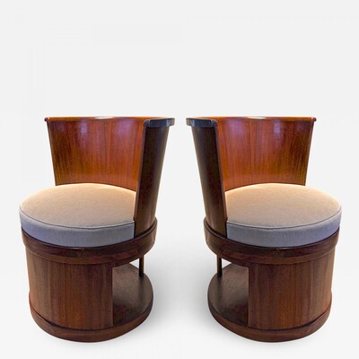 Pierre Chareau style modernist pair of barrel swiveling chairs