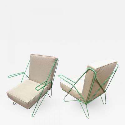 Raoul Guys pair aqua metal chairs