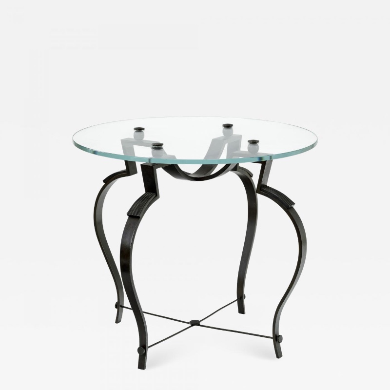 Raymond subes refined wrought iron coffee table